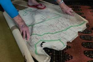 A farmer points to map of her farm boundaries in Mvurwi, repossessed during Zimbabwes land reform programme.  By Jekesai NJIKIZANA (AFP/File)