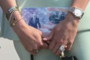 A limited edition US patriot passport featuring an image of President Donald Trump.  By SAUL LOEB (AFP)