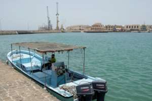 A lone boatman waits in hope for a rare tourist in the near deserted port of Massawa.  By Maheder HAILESELASSIE TADESE (AFP)