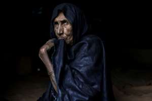 A Nemadi woman in Loudeyatt, where a dozen tents are home to about 50 people and a few bleating goats.  By JOHN WESSELS (AFP)