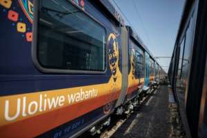 A new train with a commemorative image of South Africas first black president Nelson Mandela.  By Michele Spatari (AFP)