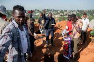 A pastor leads a funeral service for an Ebola victim in Bunia, Ituri province, in eastern Democratic Republic of Congo.  By Jospin Mwisha (AFP)