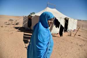 A Sahrawi refugee walks through the Boujdour camp in Algeria, just over the border from the disputed territory of Western Sahara