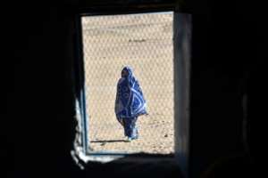 A Sahwari refugee walks in the Boujdour camp in Algeria, over the border from the disputed desert territory of Western Sahara