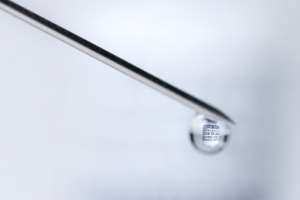 A syringe with a vial filled with Covid-19 vaccine. Negotiators have a week to complete the missing piece of the agreement.  By JOEL SAGET (AFP)