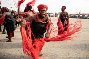 A traditional group performed the final funeral rites of former Ghana President Rawlings.  By Nipah Dennis (AFP)