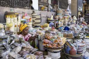 A vendor is seen at a Dakar market in January 2025 in Senegal, which is working to secure a new IMF aid program.  By PATRICK MEINHARDT (AFP/File)