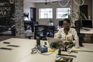 A worker types on her computer in Maliyo office in Lagos on January 20, 2025.  By OLYMPIA DE MAISMONT (AFP)