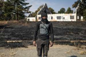 A Zama-Zama (informal miner) at a mining village outside Carletonville, west of Johannesburg.  By EMMANUEL CROSET (AFP)