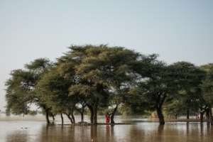 Across huge areas of Africa, climate change has thrown weather patterns into turmoil and made flooding much more severe.  By GUY PETERSON (AFP)