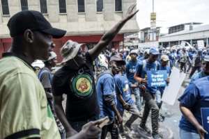 African National Congress supporters heckled Democratic Alliance protesters in Johannesburg.  By MARCO LONGARI (AFP)