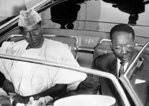 Ahmed Sekou Toure (left) with Senegals poet-president Leopold Sedar Senghor in 1963.  By - (AFP/File)