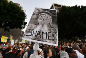 Americans protest against ICE raids and detentions in Los Angeles.  By Mark RALSTON (AFP)