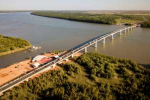 An aerial view of the new concrete bridge which crosses the River Gambia.  By Emilie IOB (AFP)