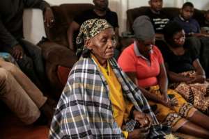 Anastacio Mataveles mother mourns his death with his family in Xai-Xai.  By GIANLUIGI GUERCIA (AFP)