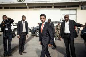 Andry Rajoelina (C) won 55.66 percent of the vote against 44.34 percent for Ravalomanana, according to results published by the electoral commission.  By RIJASOLO (AFP)