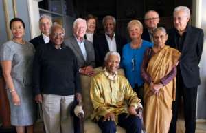 Annan was a member of The Elders group set up in 2007 by Nelson Mandela (seated) along with the likes of Desmond Tutu and former US president Jimmy Carter.  By Jeff Moore (The Elders/AFP/File)