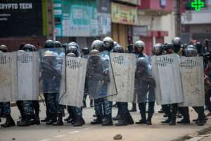 Anti-riot police deployed on the streets of the capital Antananarivo during an opposition protest, on November 11.  By MAMYRAEL (AFP)