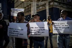 Anti-vaxx: Demonstrators in Johannesburg voice their opposition in July.  By MARCO LONGARI (AFP/File)