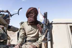 Armed members of the National Movement for the Liberation of Azawad at the Battle dAmachach camp on May 6.  By - (AFP)