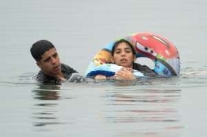 At least 34 peole died trying to enter the territory.  By JORGE GUERRERO (AFP)