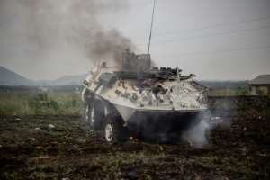 At least one armoured vehicle of the UN peacekeeping force was hit between Goma and Sake.  By Jospin Mwisha (AFP)