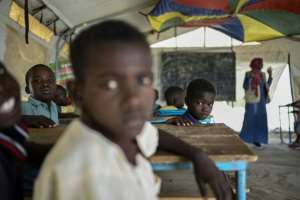 At the Al-Hishan camp in Sudan, tents arranged in a square function as an elementary school for more than 1,000 children displaced by the war.  By Khaled DESOUKI (AFP)