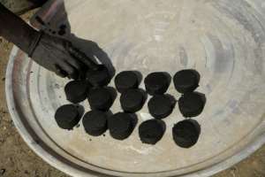 At the moment around 300 people, mostly women, are involved in producing the briquettes.  By Simon MAINA AFP