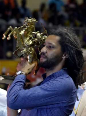 Award: The 2017 winner of the Golden Stallion of Yennenga, Senegalese-French filmmaker Alain Gomis. By ISSOUF SANOGO (AFP)