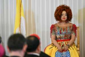 Behind one of the factions looms First Lady Chantal Biya.  By Alberto PIZZOLI (AFP)