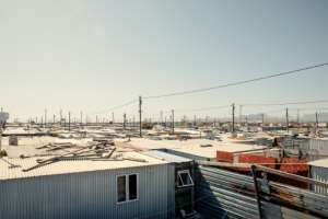 Blikkiesdorp is made up of row upon row of shacks on a desolate patch of land.  By GIANLUIGI GUERCIA (AFP)