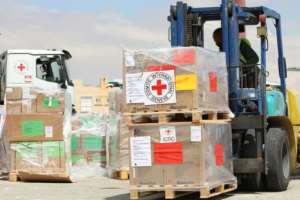Boxes of humanitarian aid in Amman, Jordan are readied for a flight to Port Sudan.  By - (ICRC/AFP)