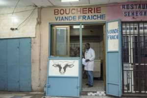 Butcher Youssouf Ori takes delivery every fortnight at dawn of around 300 kilogrammes of carcasses.  By Nao Mukadi (AFP)