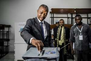 Candidate Emmanuel Ramazani Shadary, shown here casting his vote, is Kabilas chosen successor.  By Luis TATO (AFP)