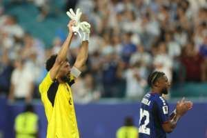 Cape Verde goalkeeper Vozinha salutes fans after his teams epic 3-2 defeat to Argentina.  By PATRICIA DE MELO MOREIRA (AFP)