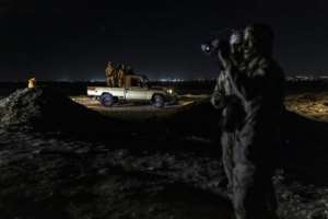 Coastguard officers are on the lookout for suspicious activity.  By PATRICK MEINHARDT (AFP)