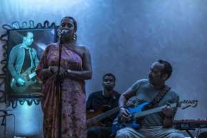 Composer and musician Hernani Almeida performs alongside Ceuzany at a concert in Mindelo, Cape Verde.  By PATRICK MEINHARDT (AFP)