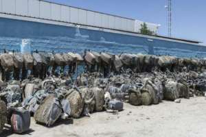 Confiscated motors used on pirogues for illegal fishing and illegal migration are impounded.  By PATRICK MEINHARDT (AFP)