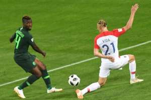 Croatias defender Domagoj Vida (R) fights for the ball with Nigerias forward Kelechi Iheanacho during the Russia 2018 World Cup Group D football match at the Kaliningrad Stadium in Kaliningrad on June 16, 2018.  By Attila KISBENEDEK (AFP)