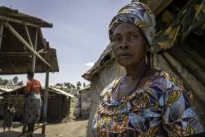 Deborah Nzale lives with nine people in a small tarpaulin shelter of barely three square metres.  By Glody MURHABAZI (AFP)