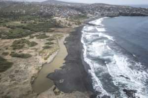 Decades of sand harvesting have left their mark on what was once the vast beach of Praia de Areia Grande, pictured here.  By PATRICK MEINHARDT (AFP)