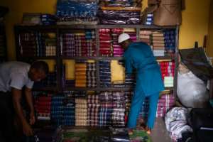 Demand for the fabric has soared at home and abroad, boosted by the diaspora and the popularity of Nigerian fashion and music.  By TOYIN ADEDOKUN (AFP)