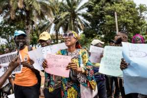 Demonstrators in Gambia presented petition letters to several government ministries, the office of the president and the National Assembly.  By MUHAMADOU BITTAYE (AFP)