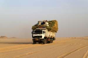 Desert track: A truck bearing food and cattle feed heads towards the Libyan border.  By Souleymane Ag Anara (AFP)