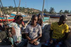 Displaced: Marcelino Teodoro, left, Shaka Alawi, centre, and Karim Kade, right, fled to Pemba after the port of Mocimboa da Praia was overrun.  By Alfredo Zuniga (AFP)