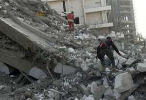 Dozens are feared trapped after the Lagos building collapse.  By PIUS UTOMI EKPEI (AFP)