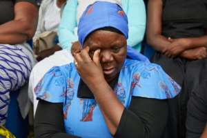 Dozens gathered for a memorial service in the lakeside town of Kariba.  By Jekesai NJIKIZANA (AFP)