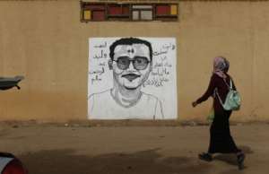 Dozens of murals have flourished across Khartoums walls since the initial weeks of the uprising.  By ASHRAF SHAZLY (AFP)