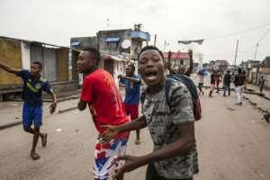 DR Congo police say 22 people were killed Tuesday in clashes in Kinshasa, Lubumbashi and other cities