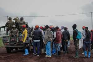 DR Congo soldiers head towards the front lines after a clash with M23 rebels.  By Aubin Mukoni (AFP)
